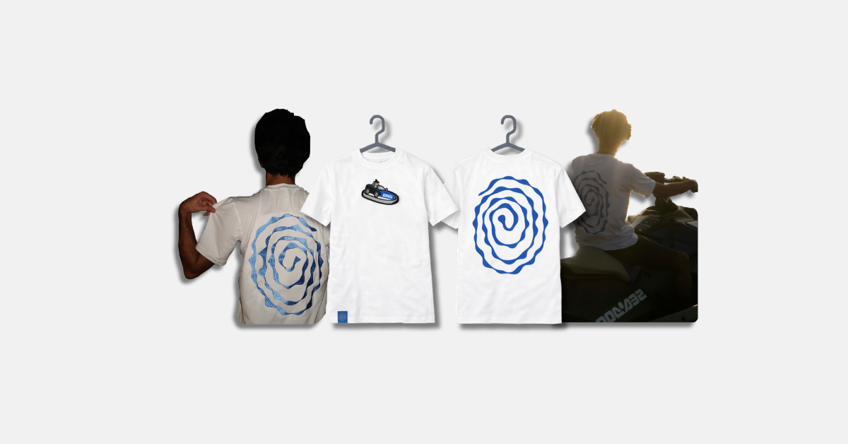 White t-shirt with blue spiral design on a white background